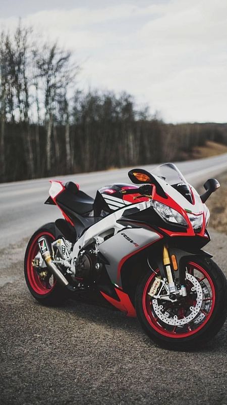 red and white sports bike