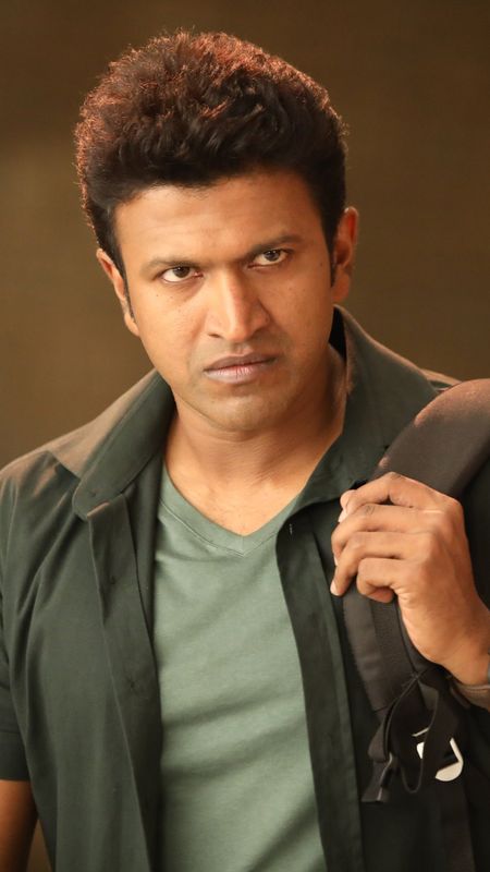 Puneeth Rajkumar - Intense Look Wallpaper Download | MobCup