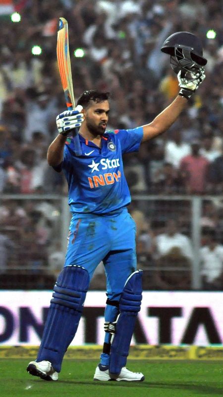 HD wallpaper Rohit Gurunath Sharma mens blue sports jersey shirt  Cricket  Wallpaper Flare